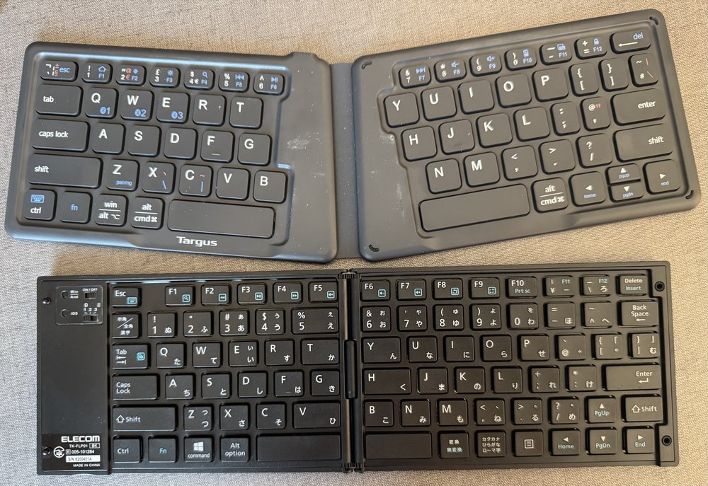The portable keyboard I've been using for this blog (top) and the new one (bottom).